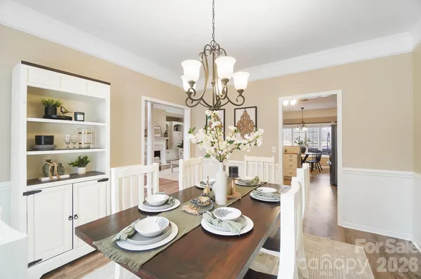a view of a dining room and chandelier
