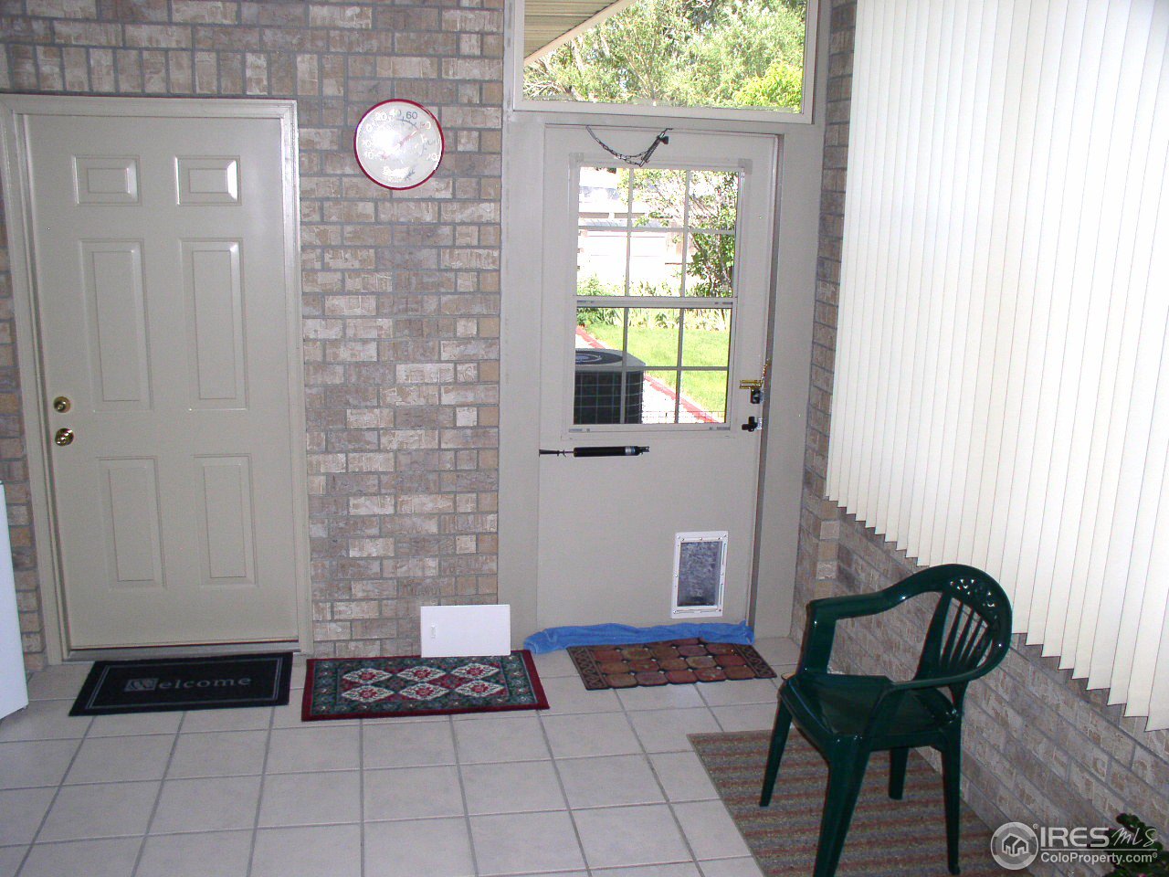 1712 Robin Road Sterling, CO 80751 - Photo 14 of 25 enclosed patio