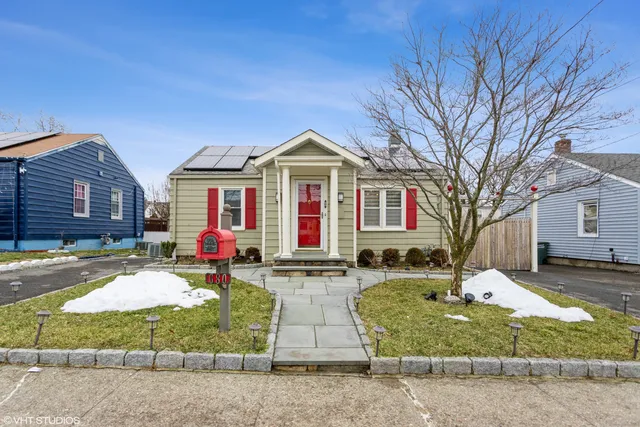 a front view of house with yard
