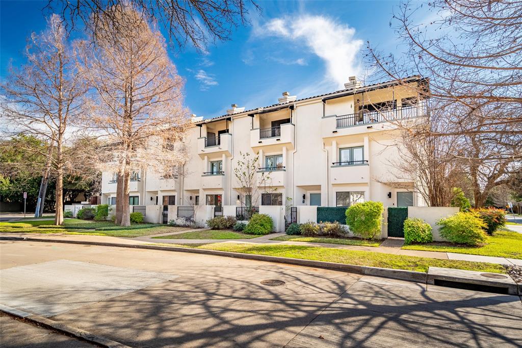 4030 Gilbert Avenue, Unit 3 Dallas, TX 75219 - Photo 1 of 1 a view of big building with a garden