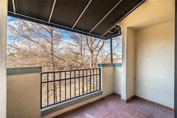 a view of porch with green space
