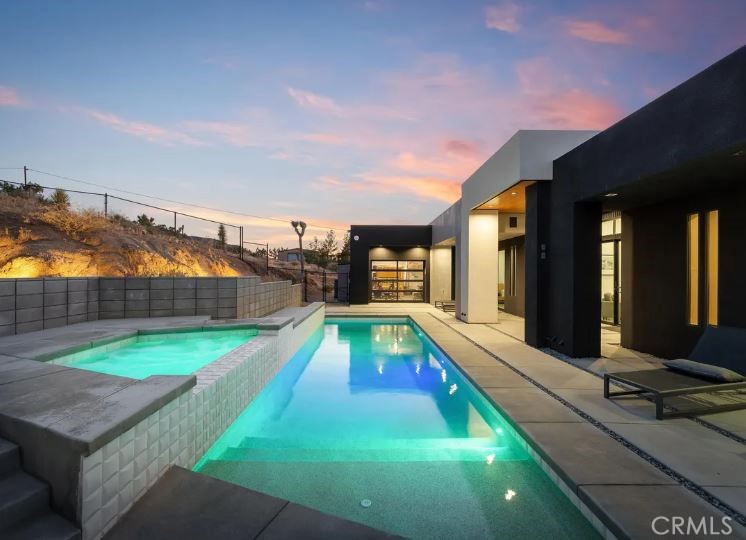 8175 Fox Trail Yucca Valley, CA 92284 - Photo 1 of 75 a swimming pool with the view of the yard