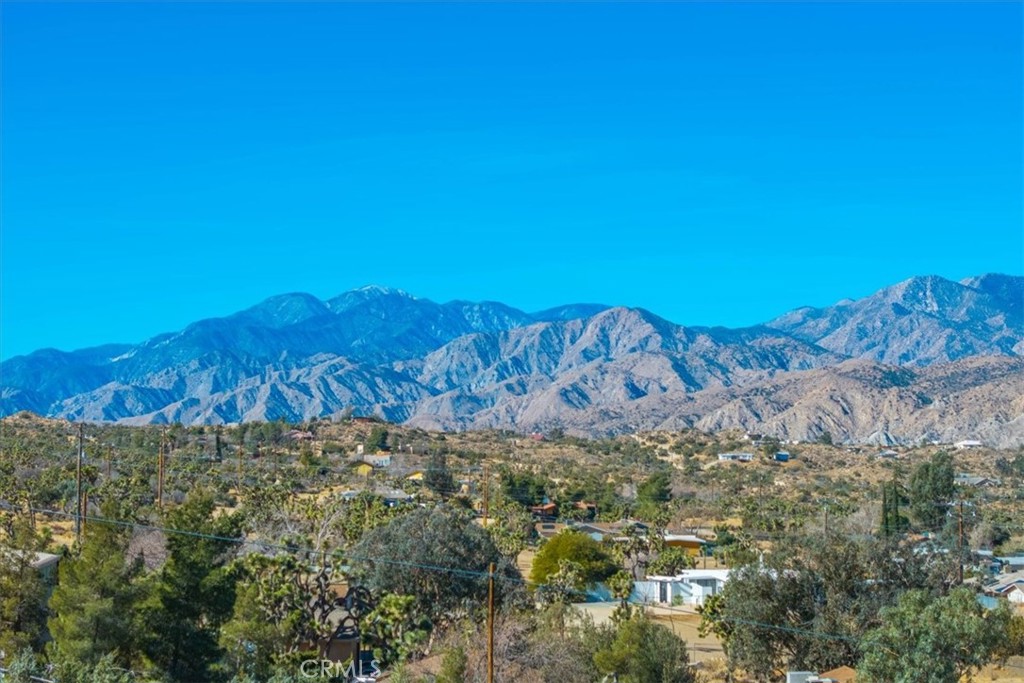 8175 Fox Trail Yucca Valley, CA 92284 - Photo 67 of 75 a view of a area with mountains in the background