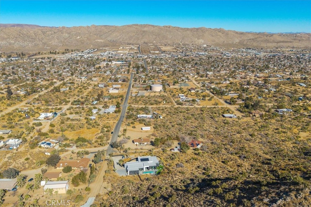 8175 Fox Trail Yucca Valley, CA 92284 - Photo 72 of 75 an aerial view of residential houses with outdoor space