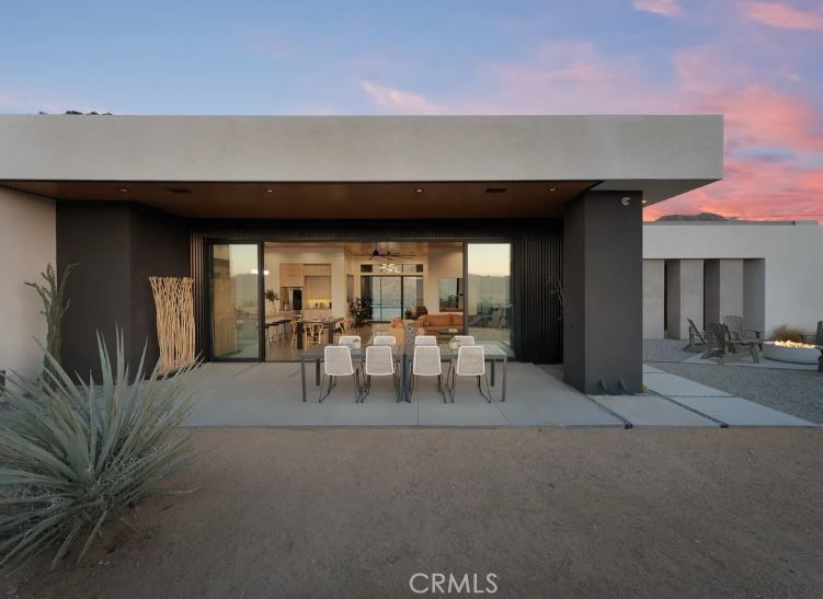 8175 Fox Trail Yucca Valley, CA 92284 - Photo 10 of 75 a view of a patio with table and chairs and potted plants