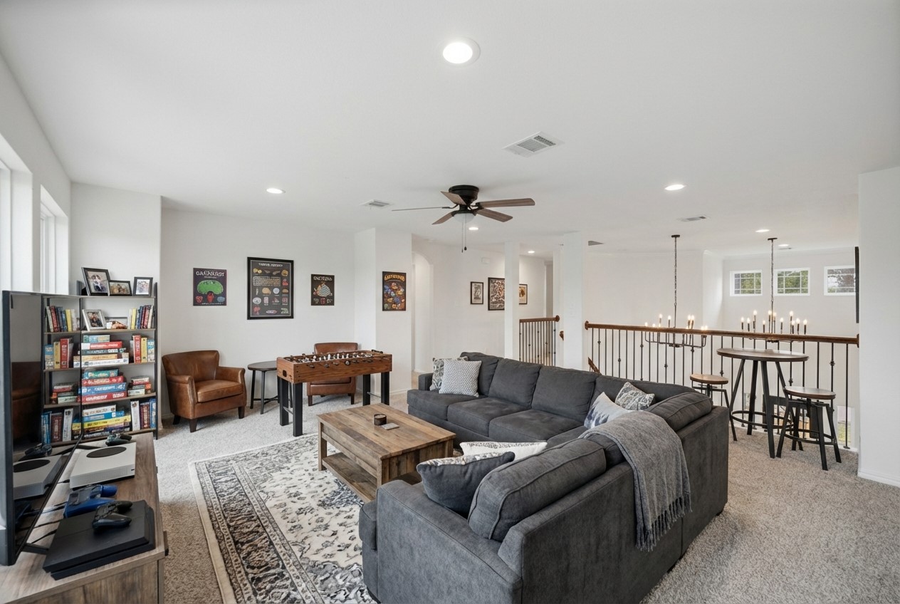16503 Boston Post Road Cypress, TX 77429 - Photo 26 of 44 a living room with furniture and a flat screen tv