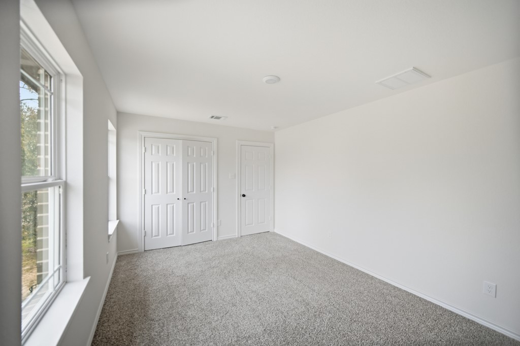 16503 Boston Post Road Cypress, TX 77429 - Photo 34 of 44 a view of an empty room and a window