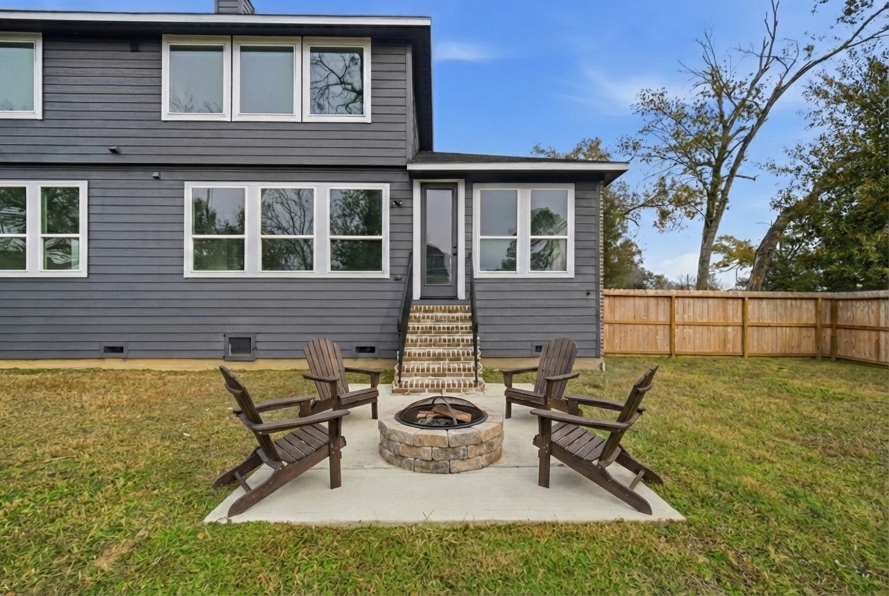 16503 Boston Post Road Cypress, TX 77429 - Photo 39 of 44 a view of a house with backyard sitting area and garden