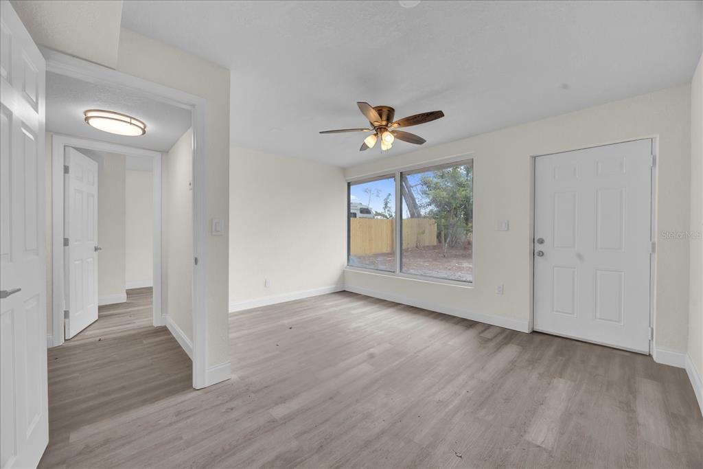 923 Ferndell Road Orlando, FL 32808 - Photo 28 of 42 a view of an empty room with a window