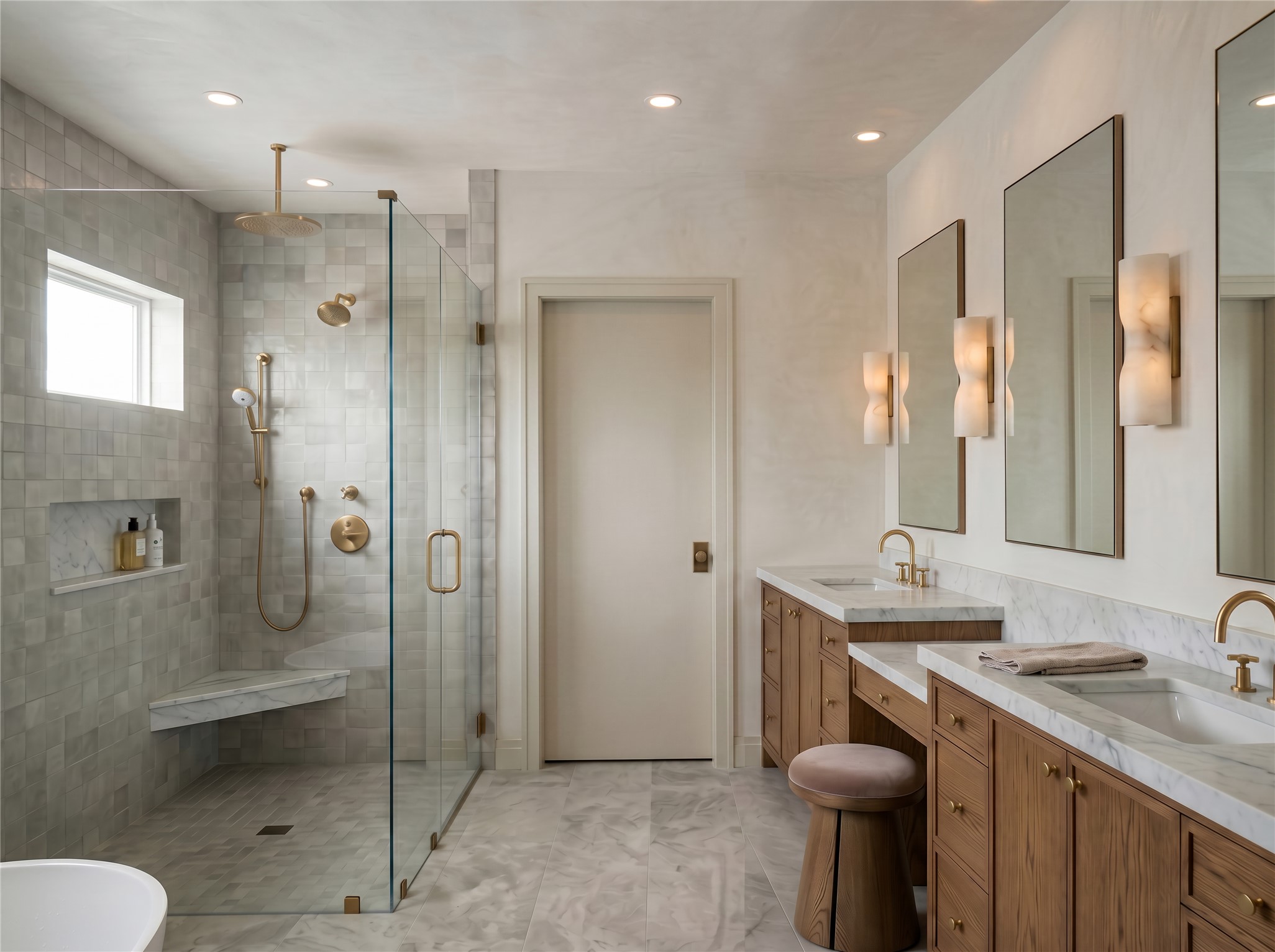 2006 Mountain View Road Austin, TX 78703 - Photo 11 of 13 Marble finishes and warm wooden cabinetry create a serene atmosphere in this primary bath.