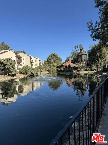 a view of a lake from a balcony