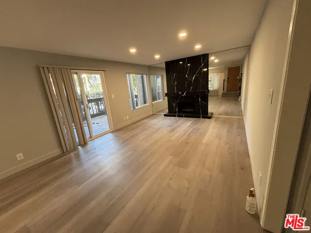 a view of livingroom with furniture and stairs