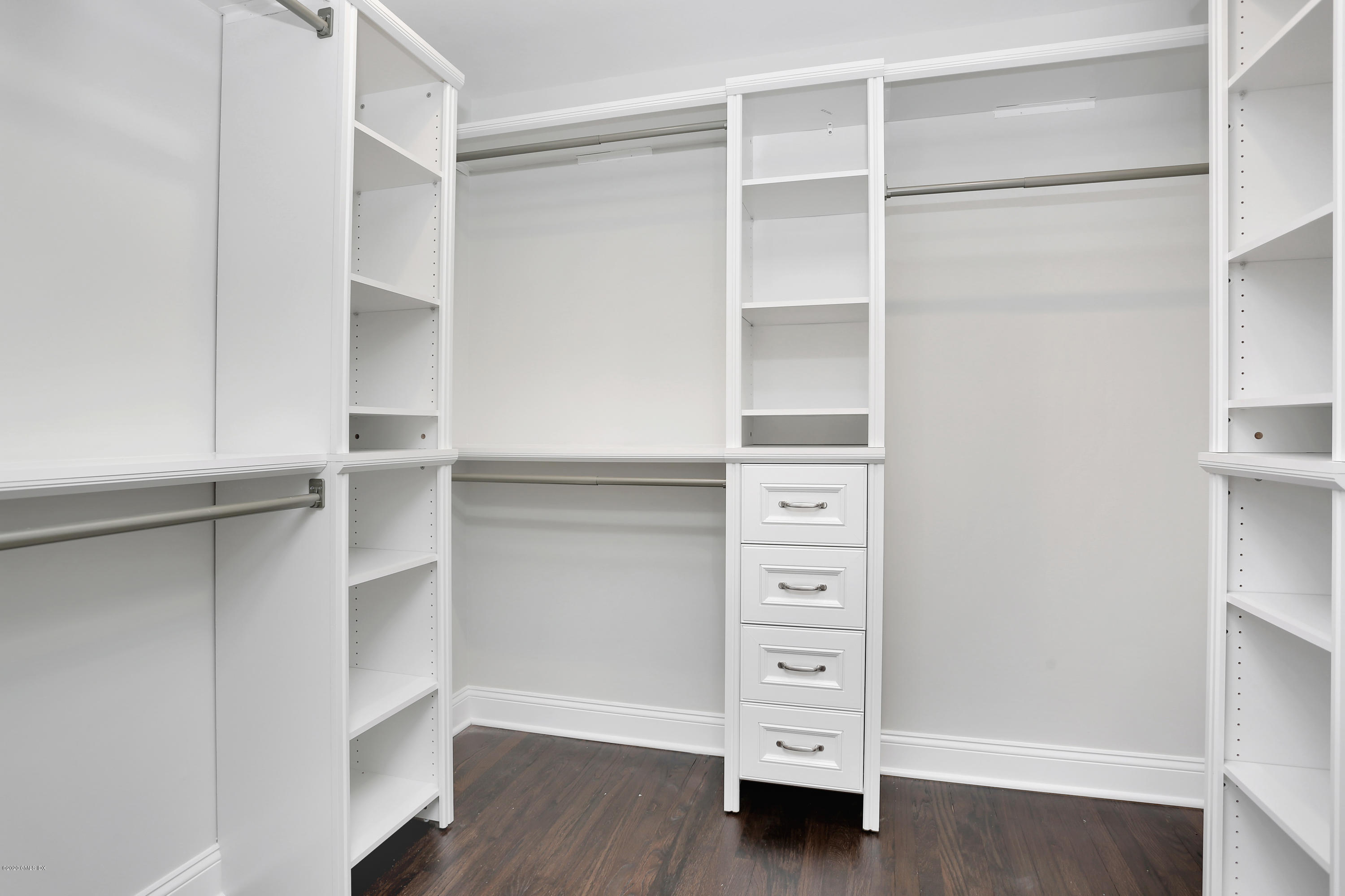 183 North Maple Avenue Greenwich, CT 06830 - Photo 17 of 26 a view of walk in closet with empty racks