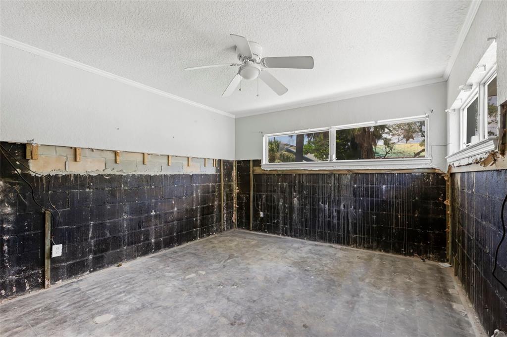 106 13th Avenue St. Pete Beach, FL 33706 - Photo 24 of 41 a view of a bathroom with a sink and mirror