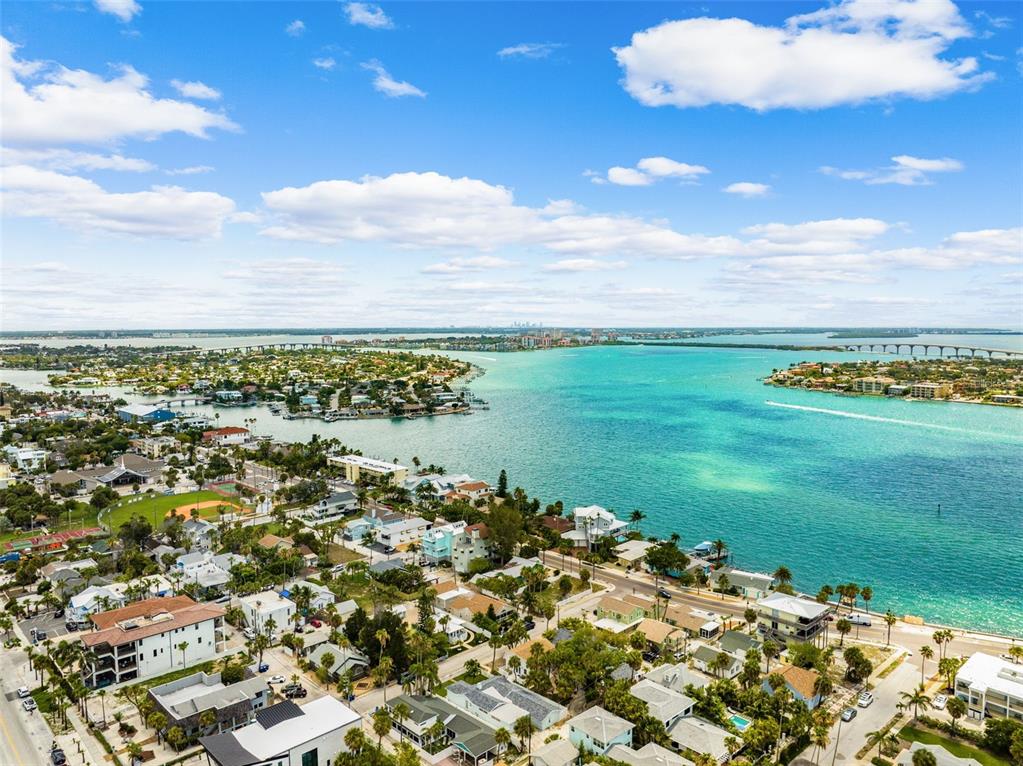 106 13th Avenue St. Pete Beach, FL 33706 - Photo 31 of 41 a view of a lake with a city