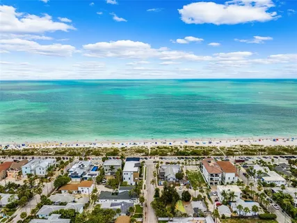 a view of an ocean and a yard