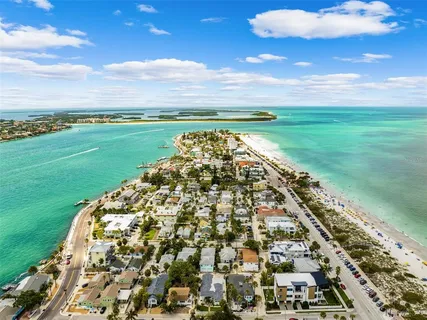 a view of a lake with a big yard