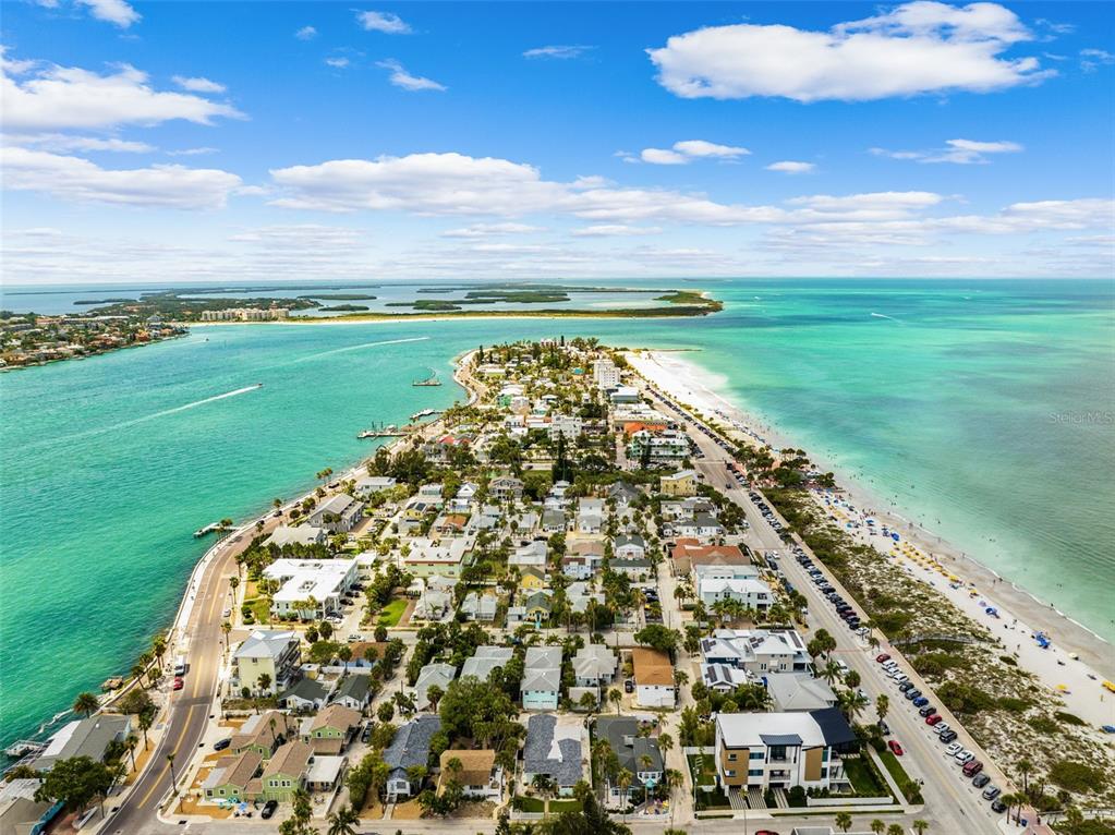 106 13th Avenue St. Pete Beach, FL 33706 - Photo 38 of 41 a view of a lake with a big yard