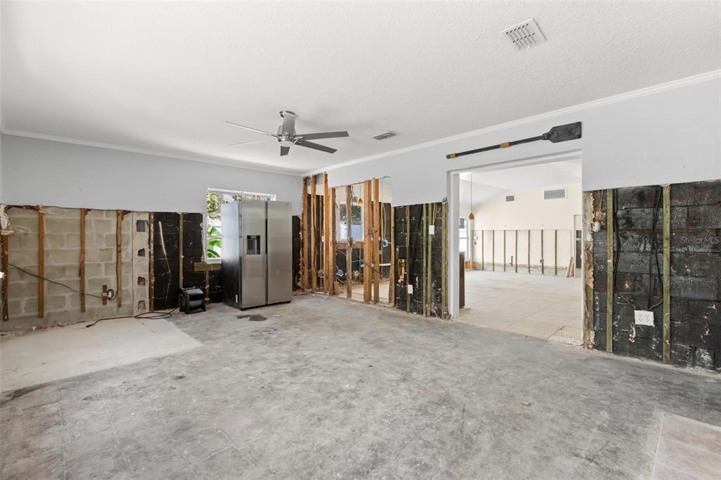 106 13th Avenue St. Pete Beach, FL 33706 - Photo 6 of 41 a view of livingroom with glass door