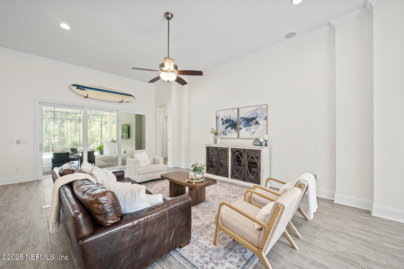 190 Deer Valley Drive Ponte Vedra, FL 32081 - Photo 16 of 95 a living room with furniture a flat screen tv and a window