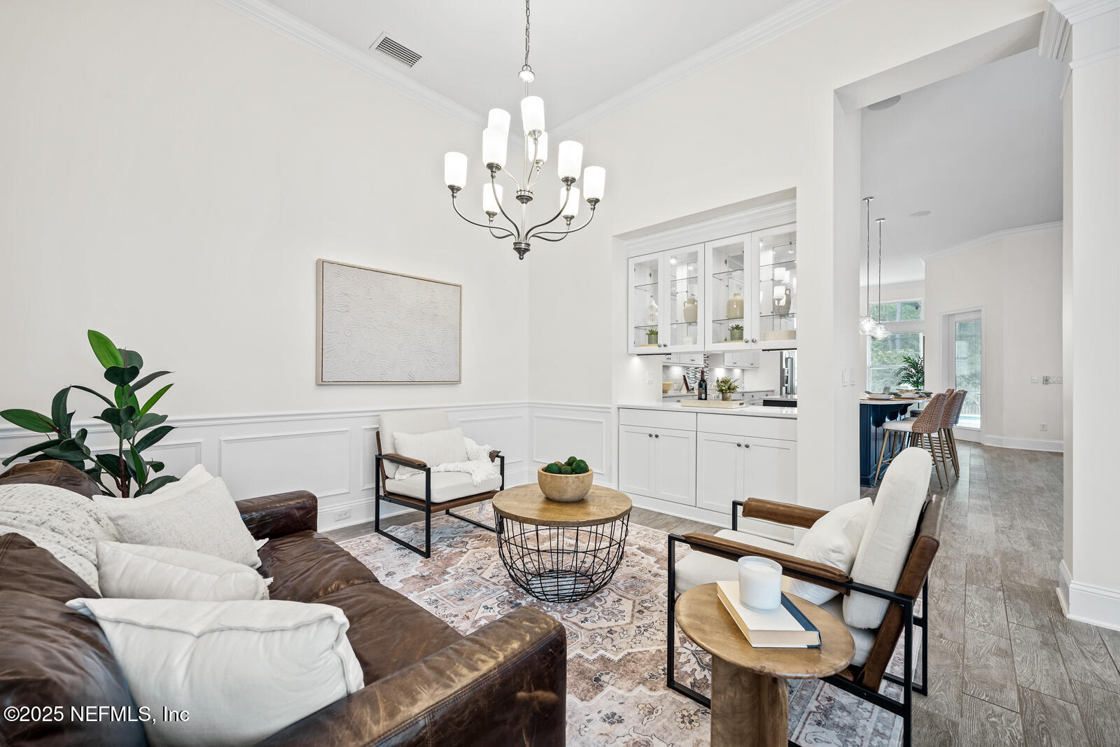 190 Deer Valley Drive Ponte Vedra, FL 32081 - Photo 20 of 95 a living room with furniture a chandelier and a dining room