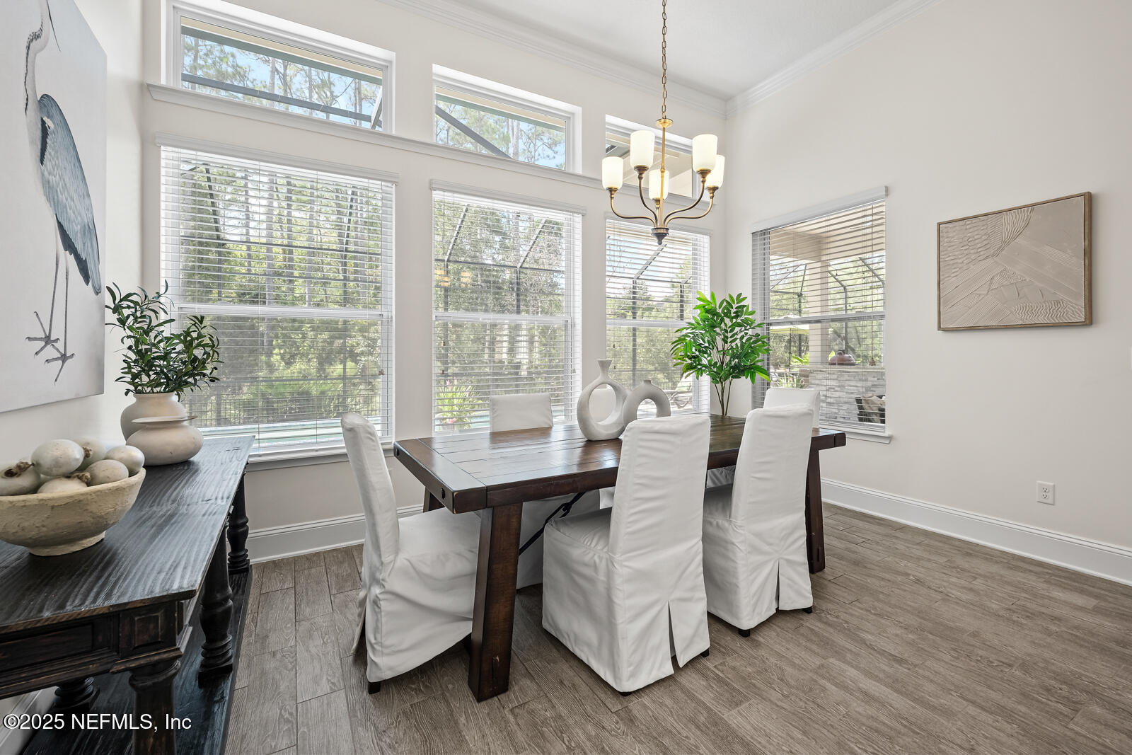 190 Deer Valley Drive Ponte Vedra, FL 32081 - Photo 31 of 95 a view of a dining room with furniture window and wooden floor