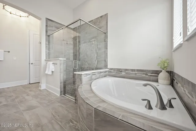 a view of a garden with a bench in a patio