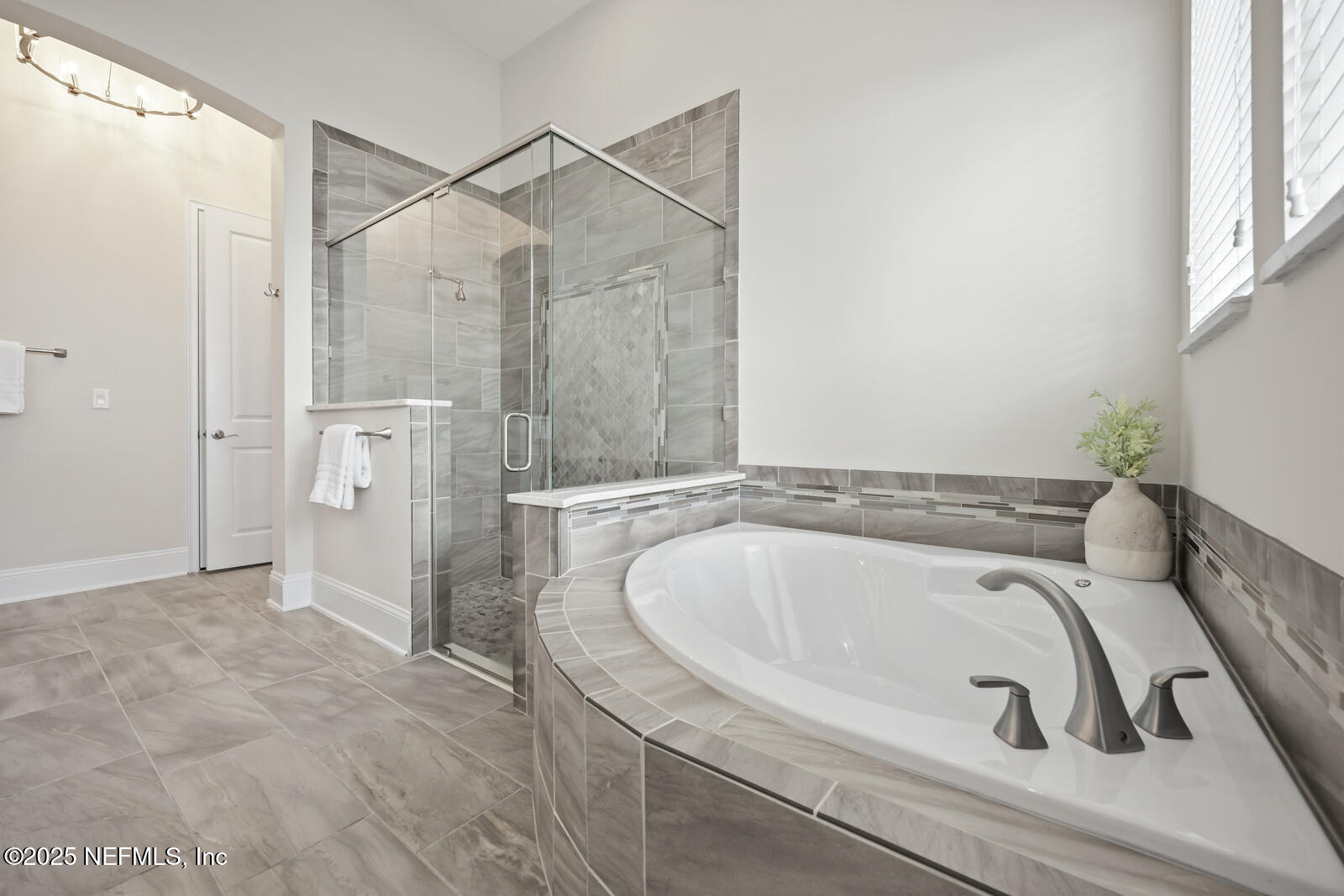 190 Deer Valley Drive Ponte Vedra, FL 32081 - Photo 38 of 95 a bathroom with a tub and shower