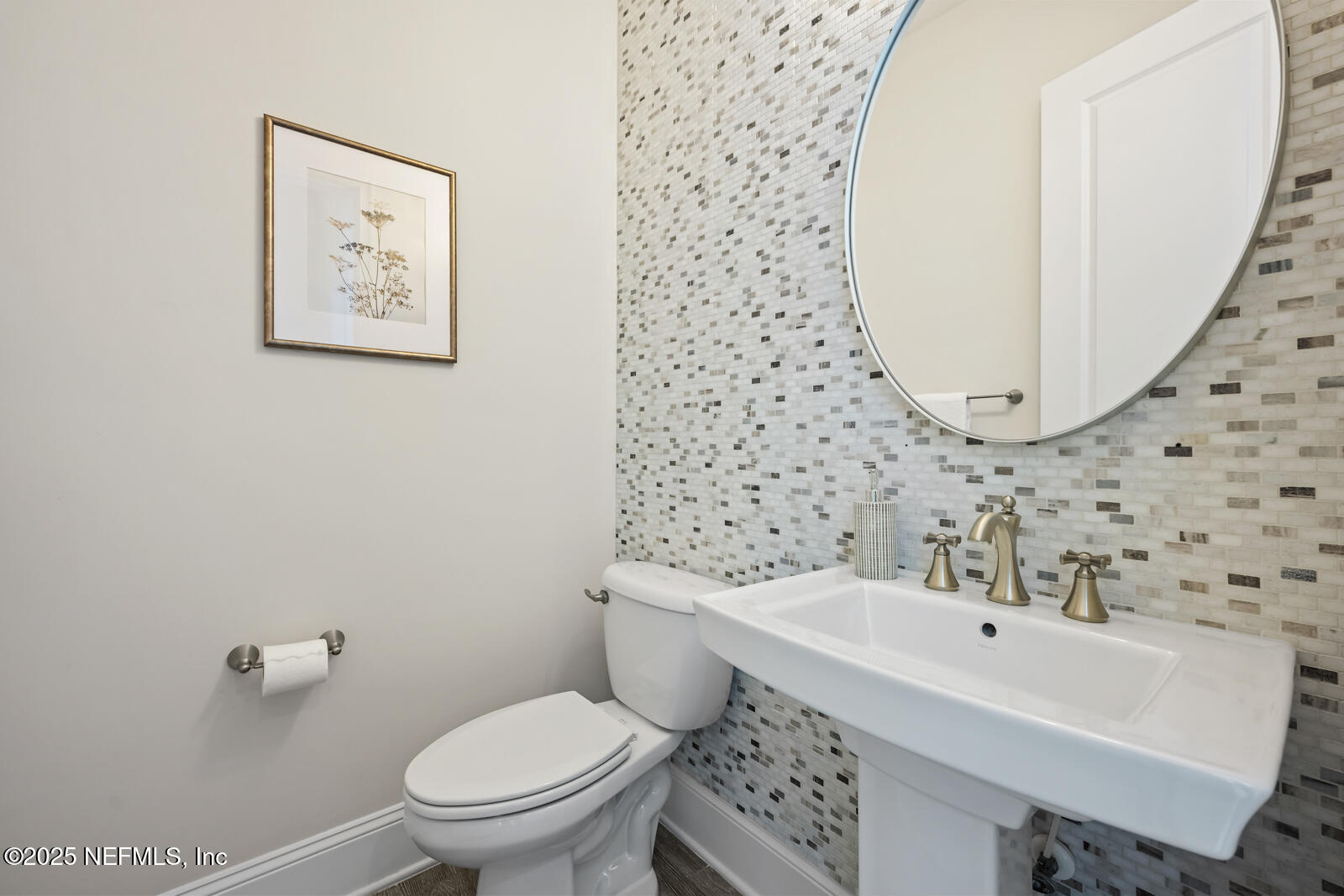 190 Deer Valley Drive Ponte Vedra, FL 32081 - Photo 43 of 95 a bathroom with a sink a toilet and a mirror