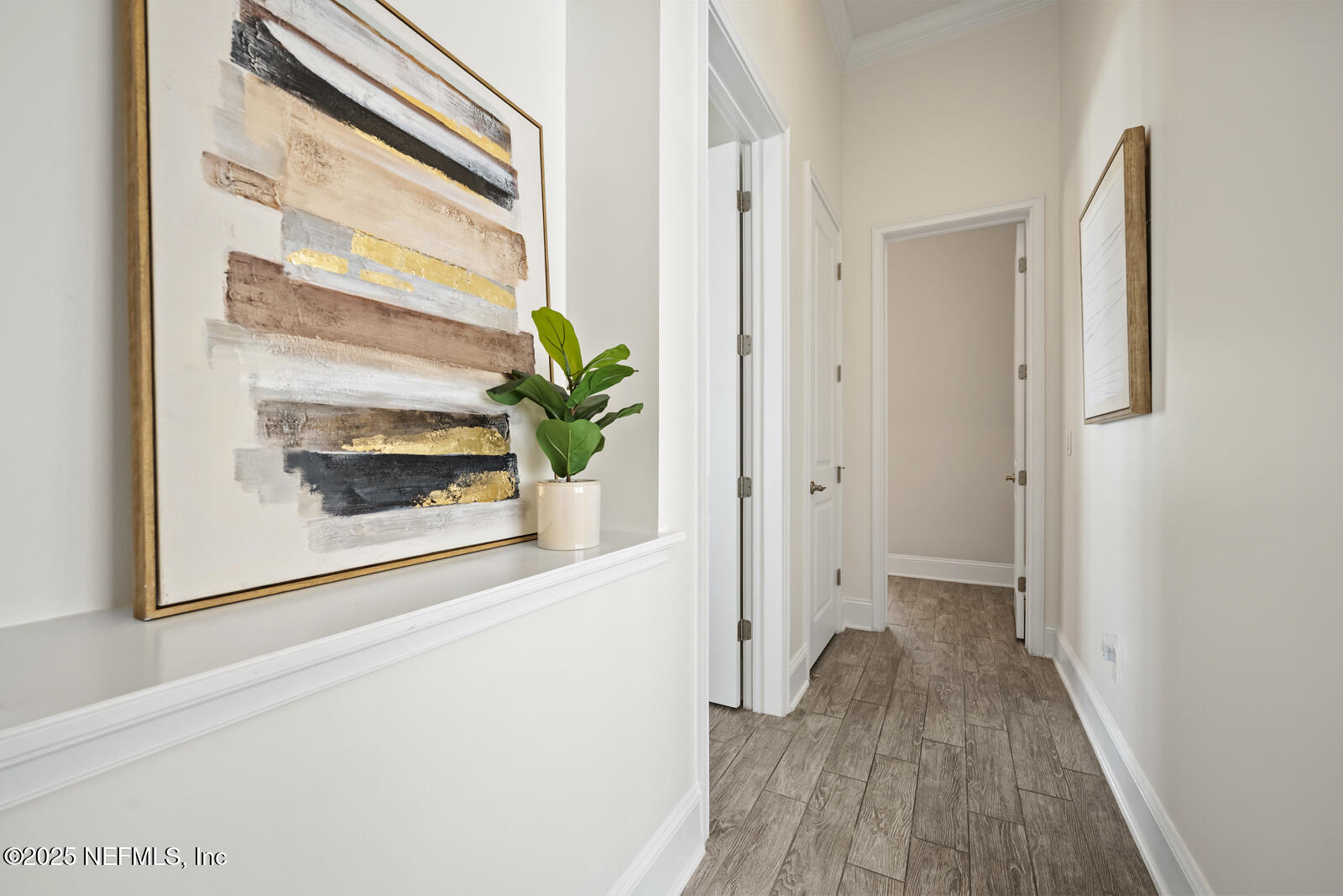 190 Deer Valley Drive Ponte Vedra, FL 32081 - Photo 44 of 95 a view of a hallway with wooden floor and a living room