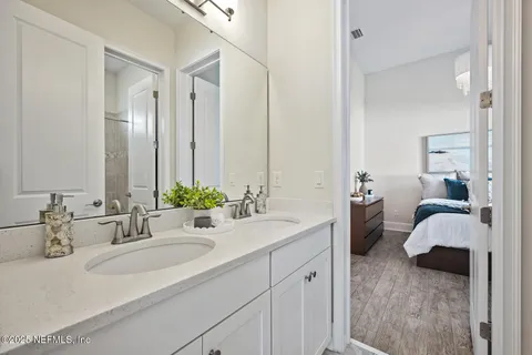 an aerial view of a house with a garden and swimming pool