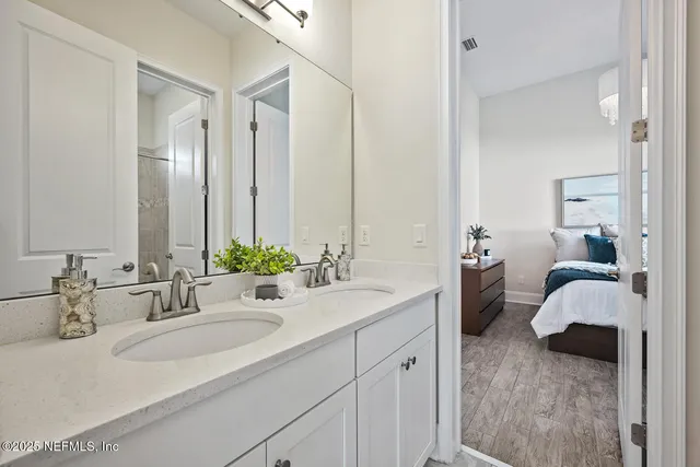 an aerial view of a house with a garden and swimming pool