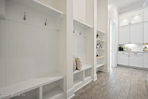 an aerial view of houses with outdoor space