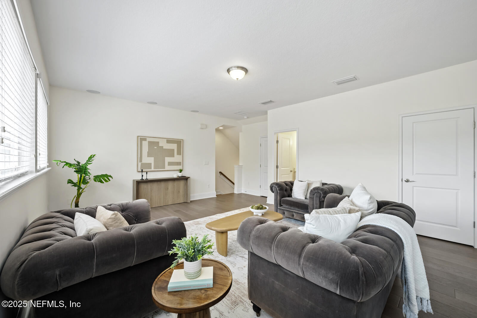 190 Deer Valley Drive Ponte Vedra, FL 32081 - Photo 57 of 95 a living room with furniture and a potted plant
