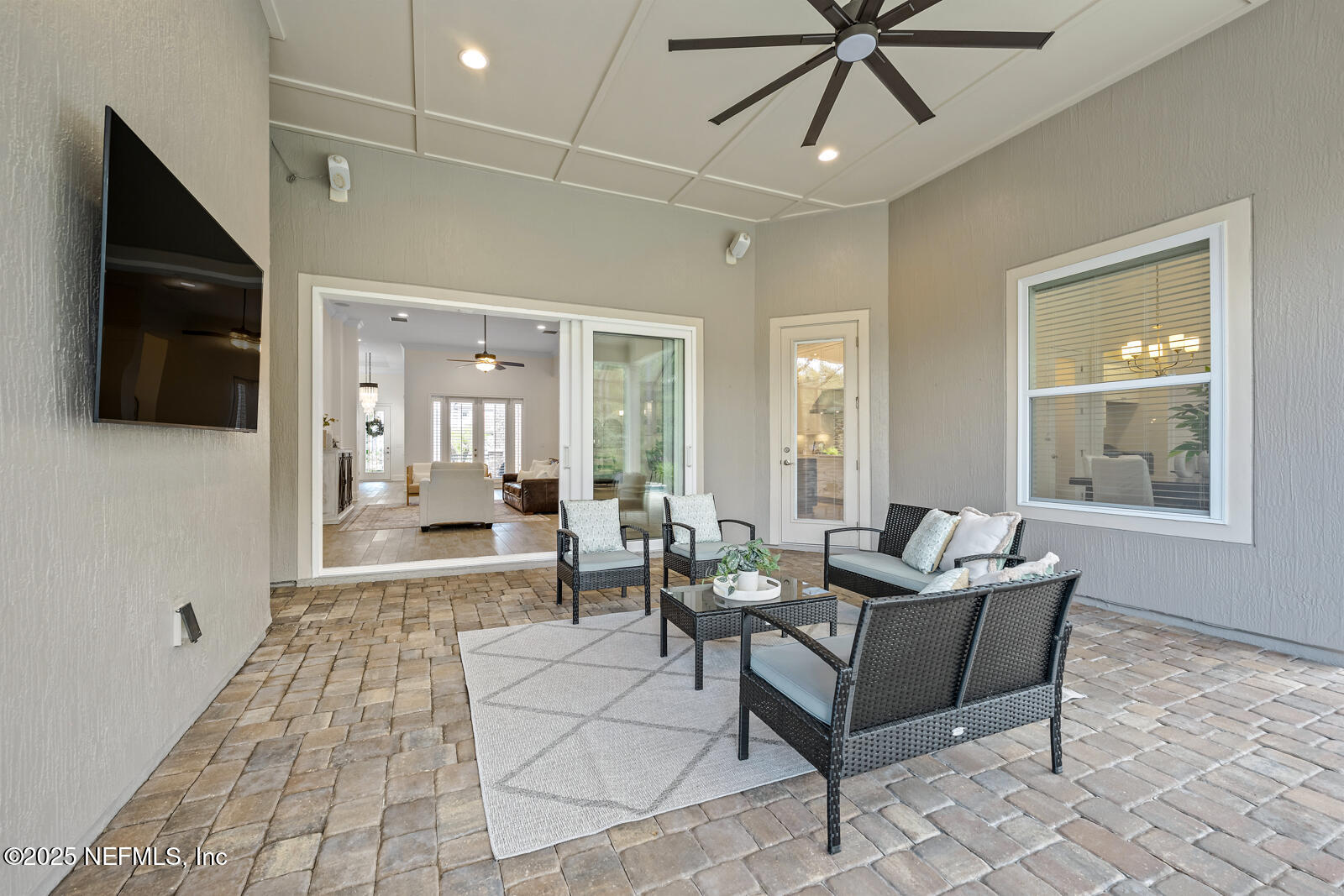 190 Deer Valley Drive Ponte Vedra, FL 32081 - Photo 59 of 95 a living room with furniture and a flat screen tv