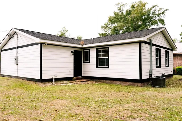 a house view with a backyard space