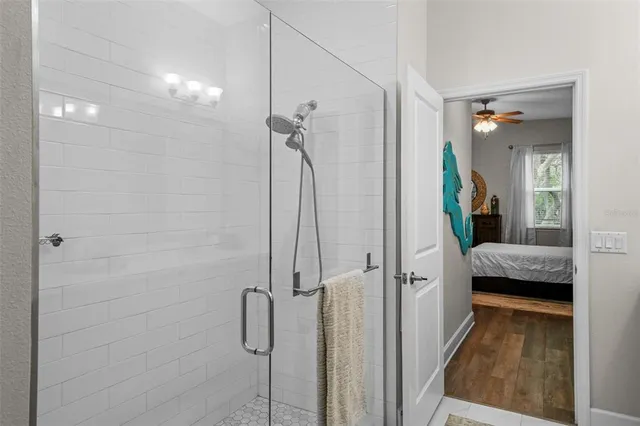 a view of walk in closet with clothes