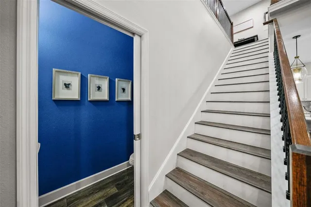a bathroom with a sink a mirror and a toilet