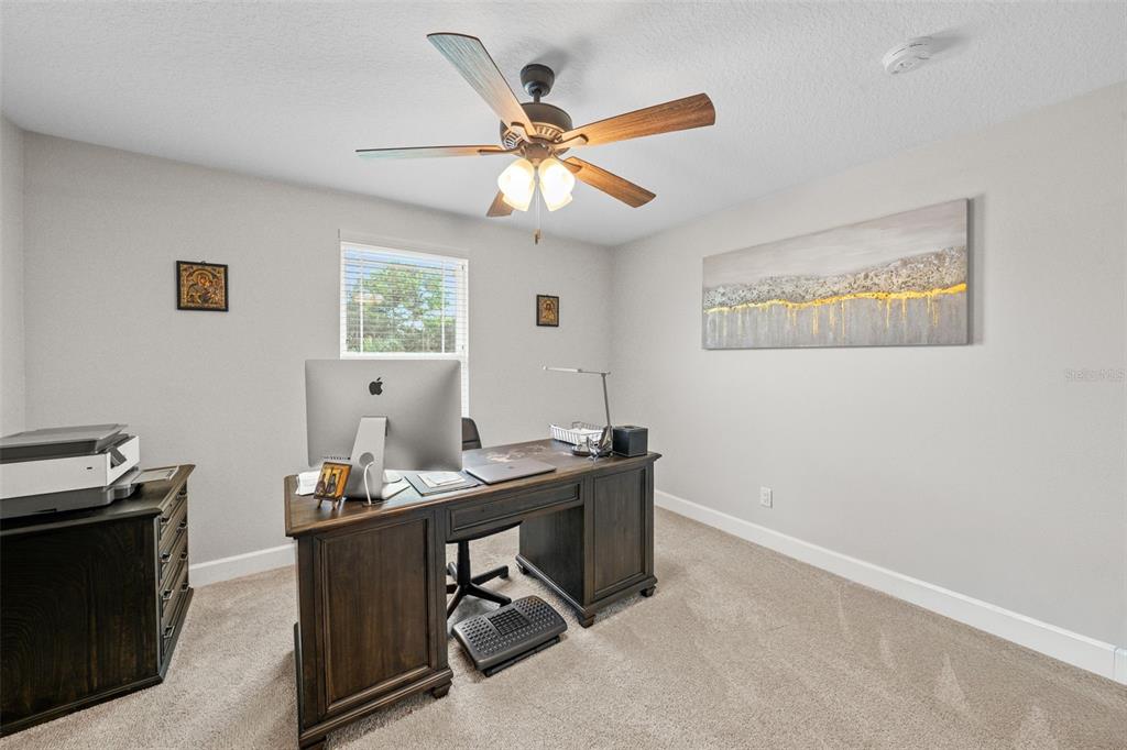 1404 Ridge Terrace Tarpon Springs, FL 34689 - Photo 26 of 38 a view of a workspace with furniture