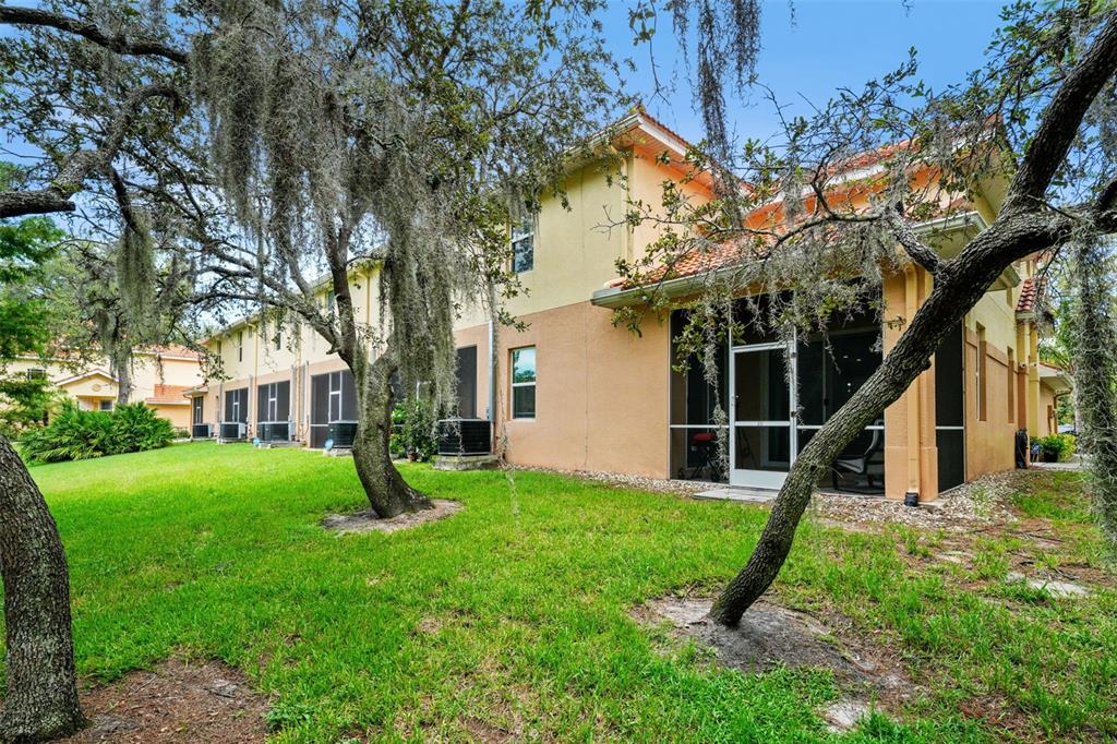 1404 Ridge Terrace Tarpon Springs, FL 34689 - Photo 35 of 38 a view of a house with a backyard