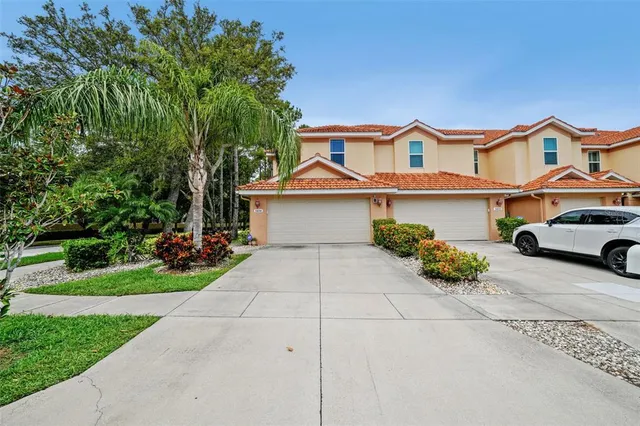 front view of a house with a small yard