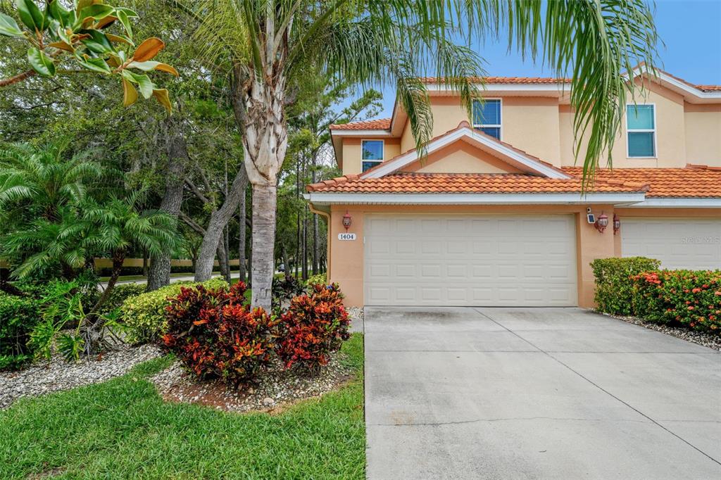 1404 Ridge Terrace Tarpon Springs, FL 34689 - Photo 38 of 38 front view of a house with a small yard