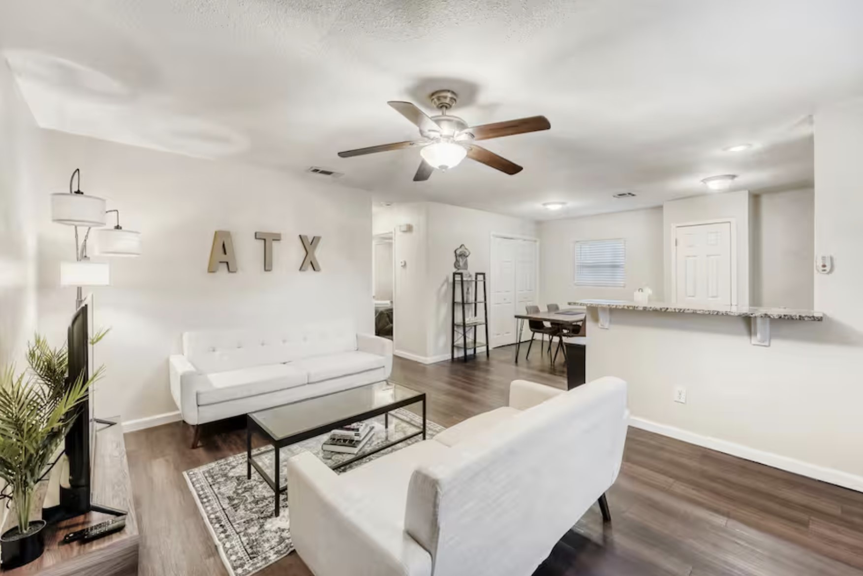 4903 Merritt Drive Austin, TX 78744 - Photo 2 of 6 a living room with furniture and a large window