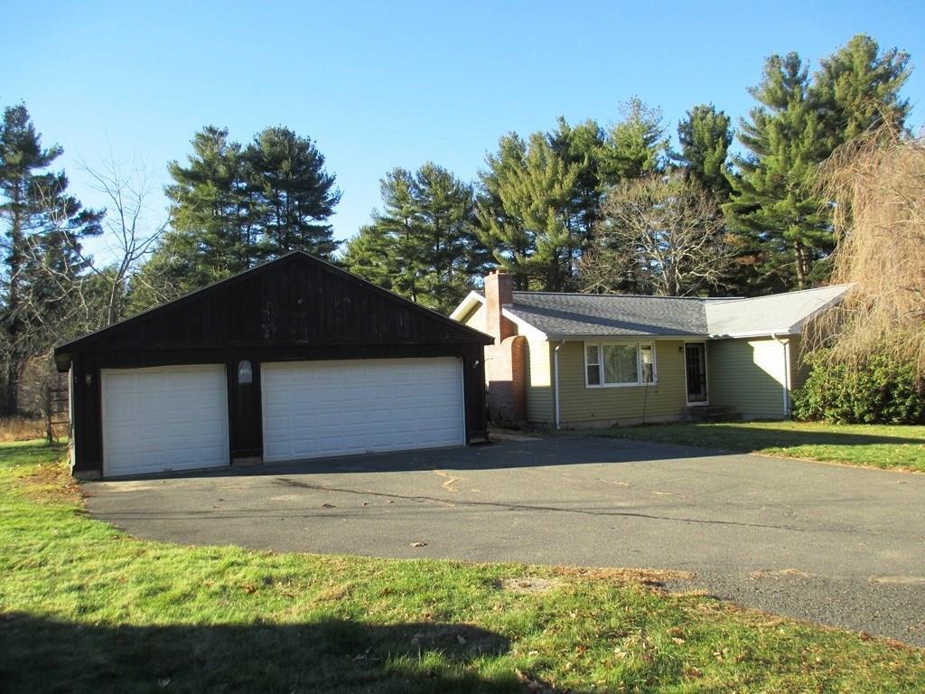 a front view of house with yard