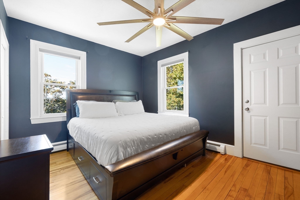 314 Water Street, Unit 5 Wakefield, MA 01880 - Photo 12 of 20 a bedroom with a bed and window