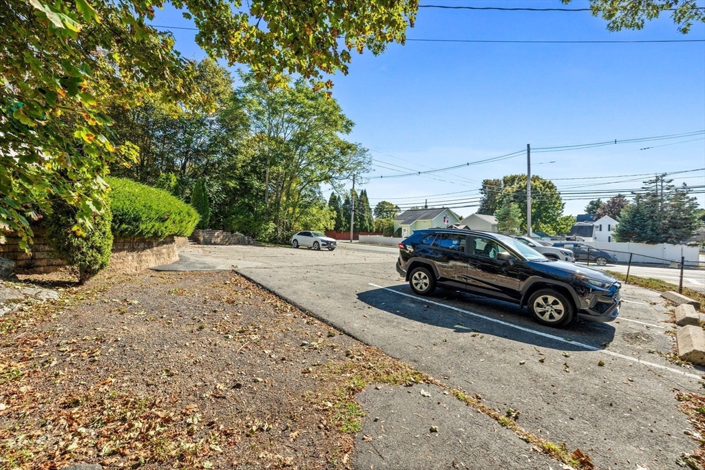 314 Water Street, Unit 5 Wakefield, MA 01880 - Photo 20 of 20 a car parked on the side of the road
