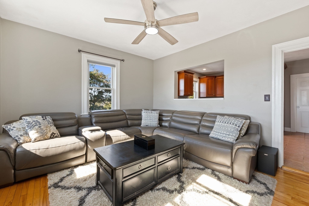 314 Water Street, Unit 5 Wakefield, MA 01880 - Photo 6 of 20 a living room with furniture and a window