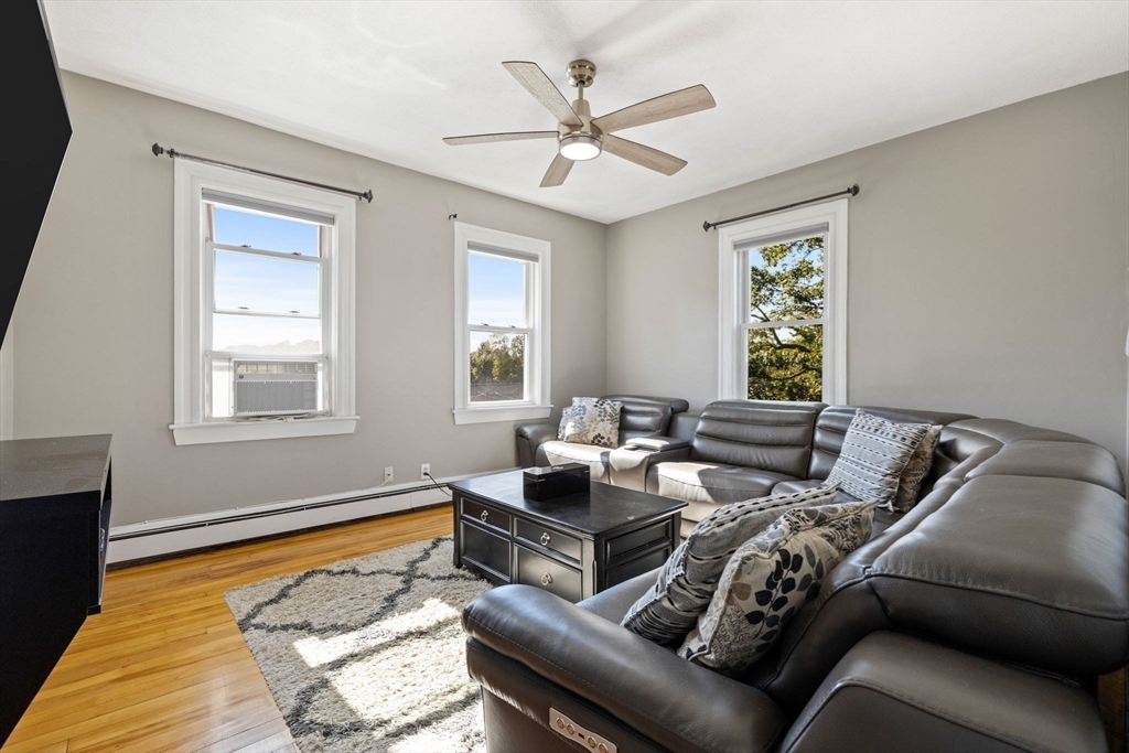 314 Water Street, Unit 5 Wakefield, MA 01880 - Photo 7 of 20 a living room with furniture and a window