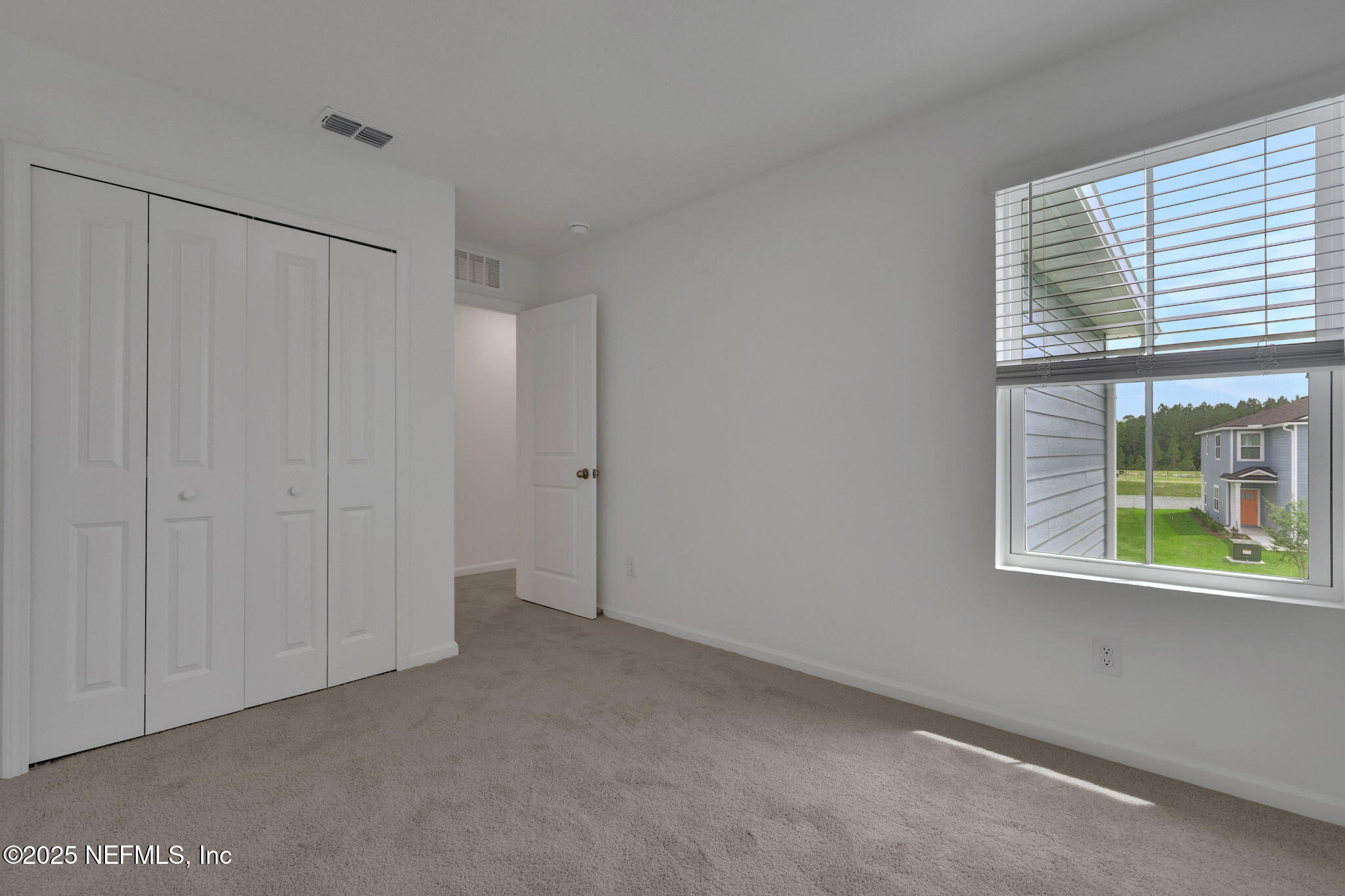 3786 Athenian Way Middleburg, FL 32068 - Photo 13 of 25 a view of an empty room with a window
