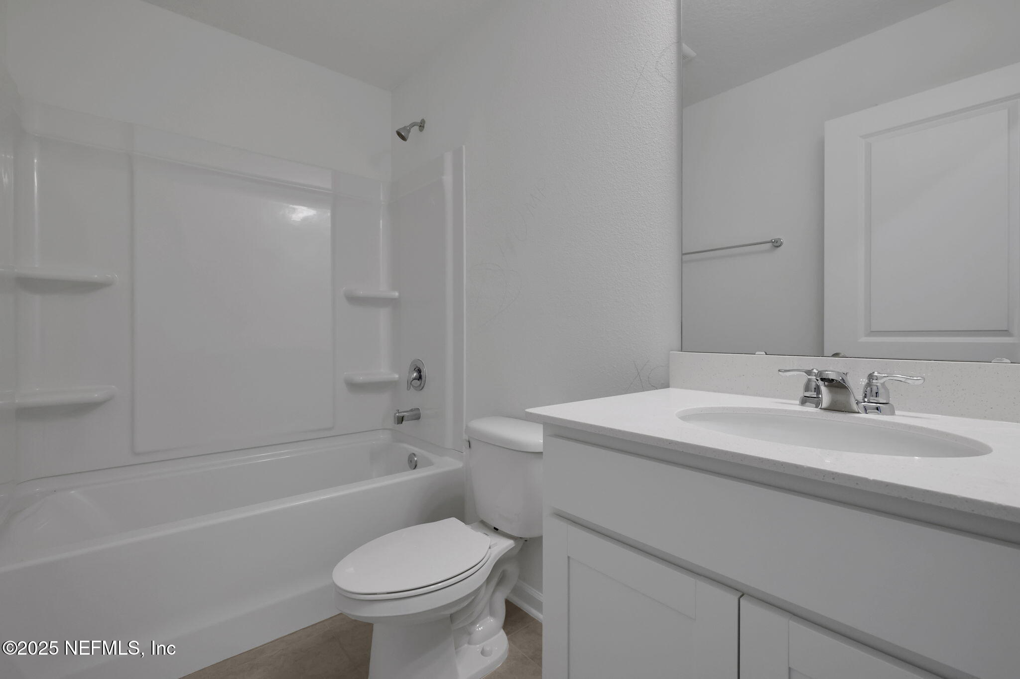 3786 Athenian Way Middleburg, FL 32068 - Photo 14 of 25 a bathroom with a sink a toilet and a bathtub